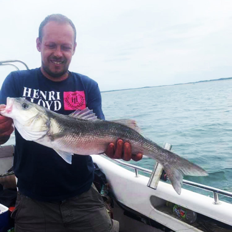 A huge bass caught out at sea near Wells-Next-The-Sea